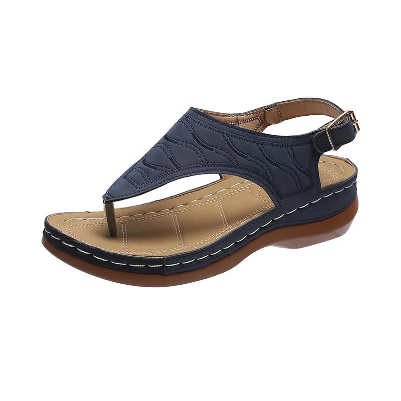Women's casual wedge heel flip flop sandals with adjustable back strap in red vegan leather