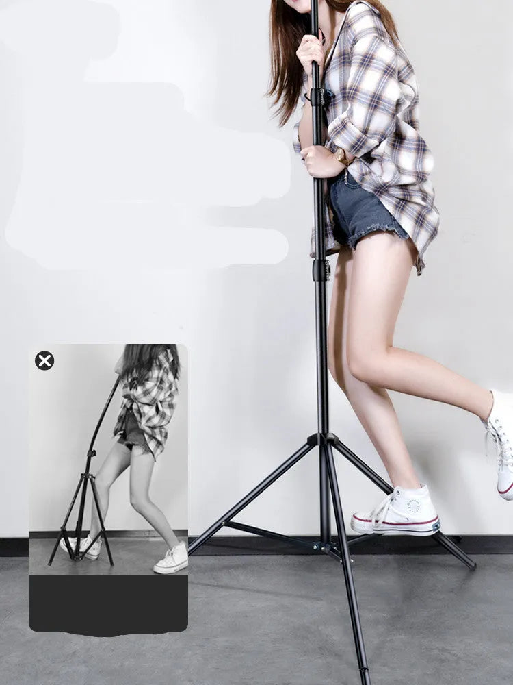 Carbon steel mobile phone tripod with a 10-inch ring light attached, shown next to its storage bag.
