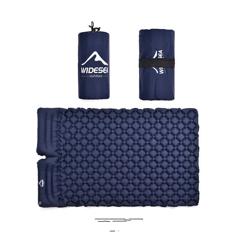 Green inflatable camping mat for two persons made from TPU nylon, shown outdoors on grass