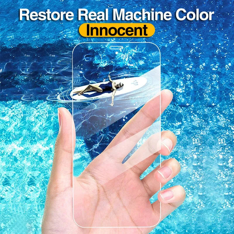 Four transparent tempered glass screen protectors for Apple iPhones on a clean surface.