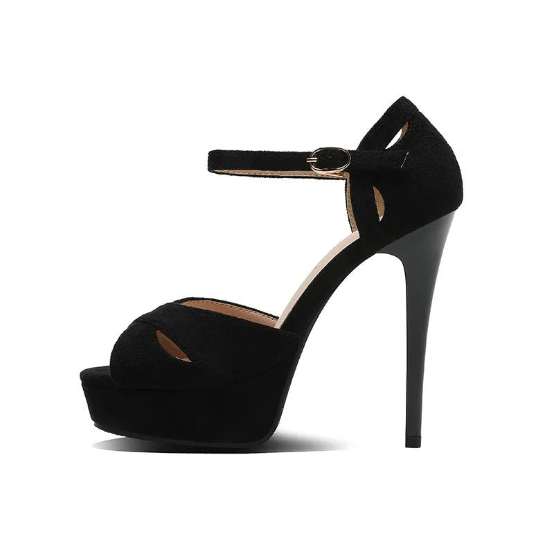 Black women's stiletto platform sandals with fish mouth toe, suede upper, and Roman style design.