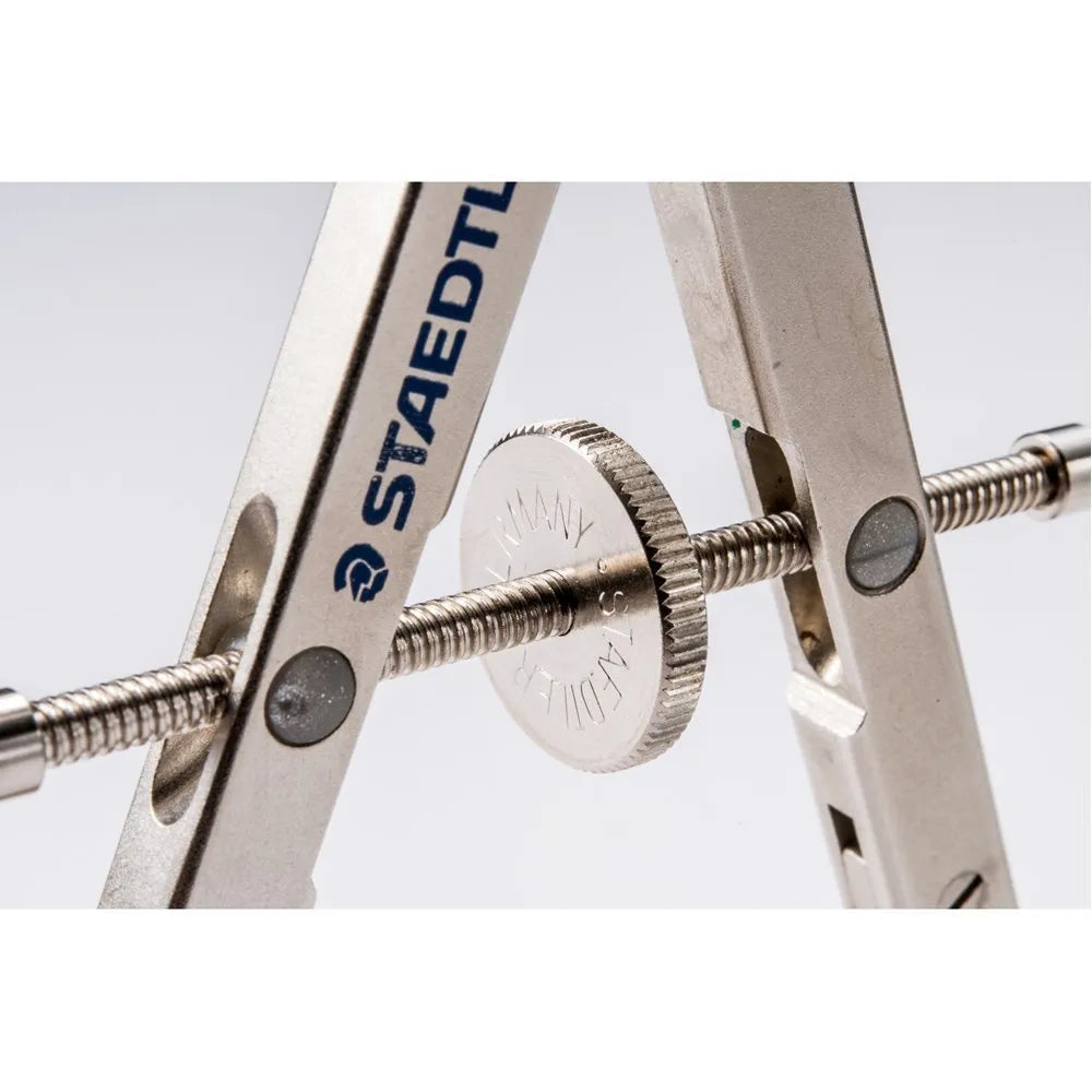 STAEDTLER 551 01 steel precision car compass with extended telescopic rod on technical drawing.