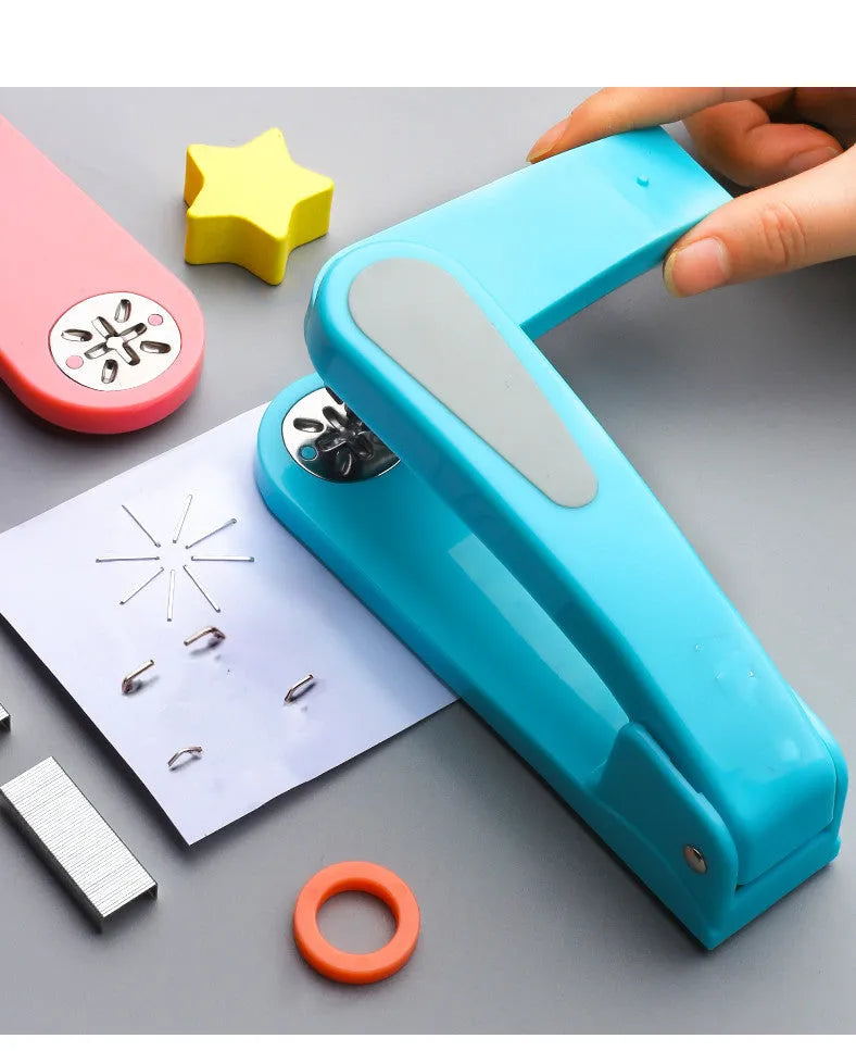 360-degree rotatable student stapler in multiple colours on a desk with paper