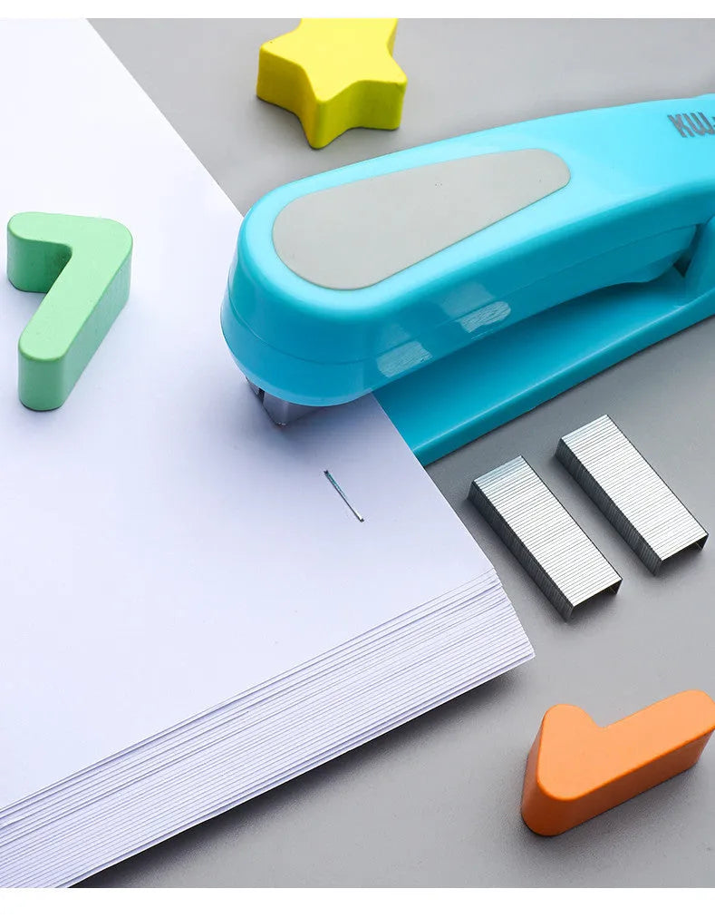 360-degree rotatable student stapler in multiple colours on a desk with paper