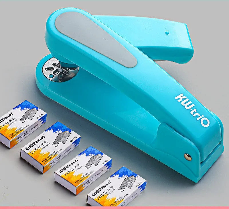 360-degree rotatable student stapler in multiple colours on a desk with paper
