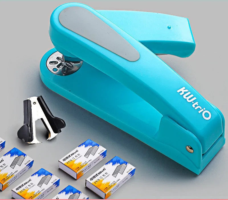 360-degree rotatable student stapler in multiple colours on a desk with paper