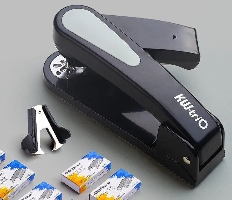 360-degree rotatable student stapler in multiple colours on a desk with paper