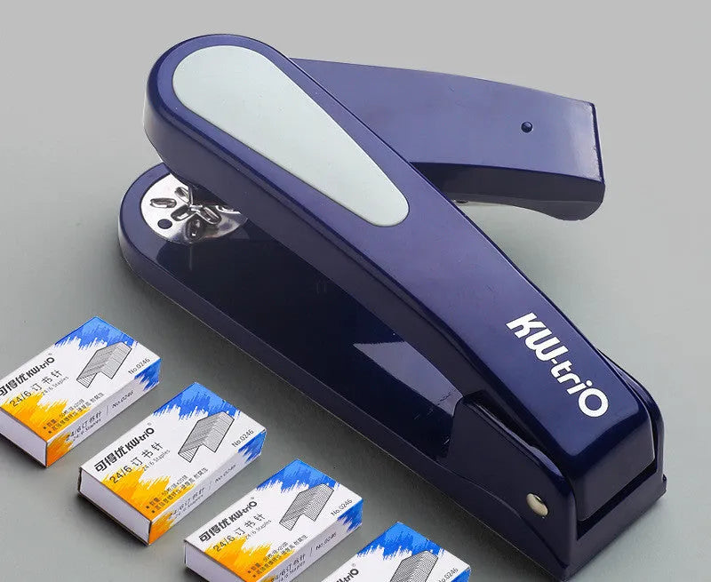 360-degree rotatable student stapler in multiple colours on a desk with paper