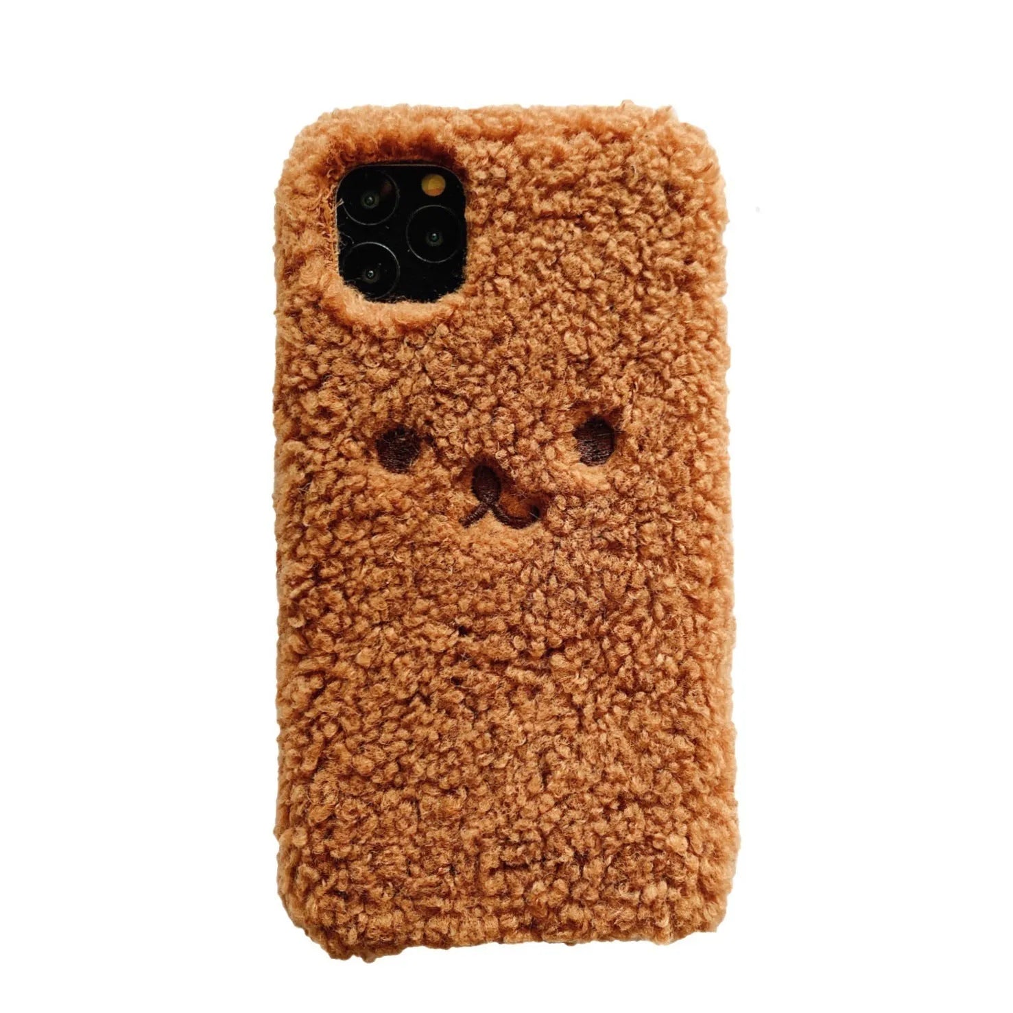 Brown TPU iPhone case with a soft embroidered plush cartoon bear face on the back.