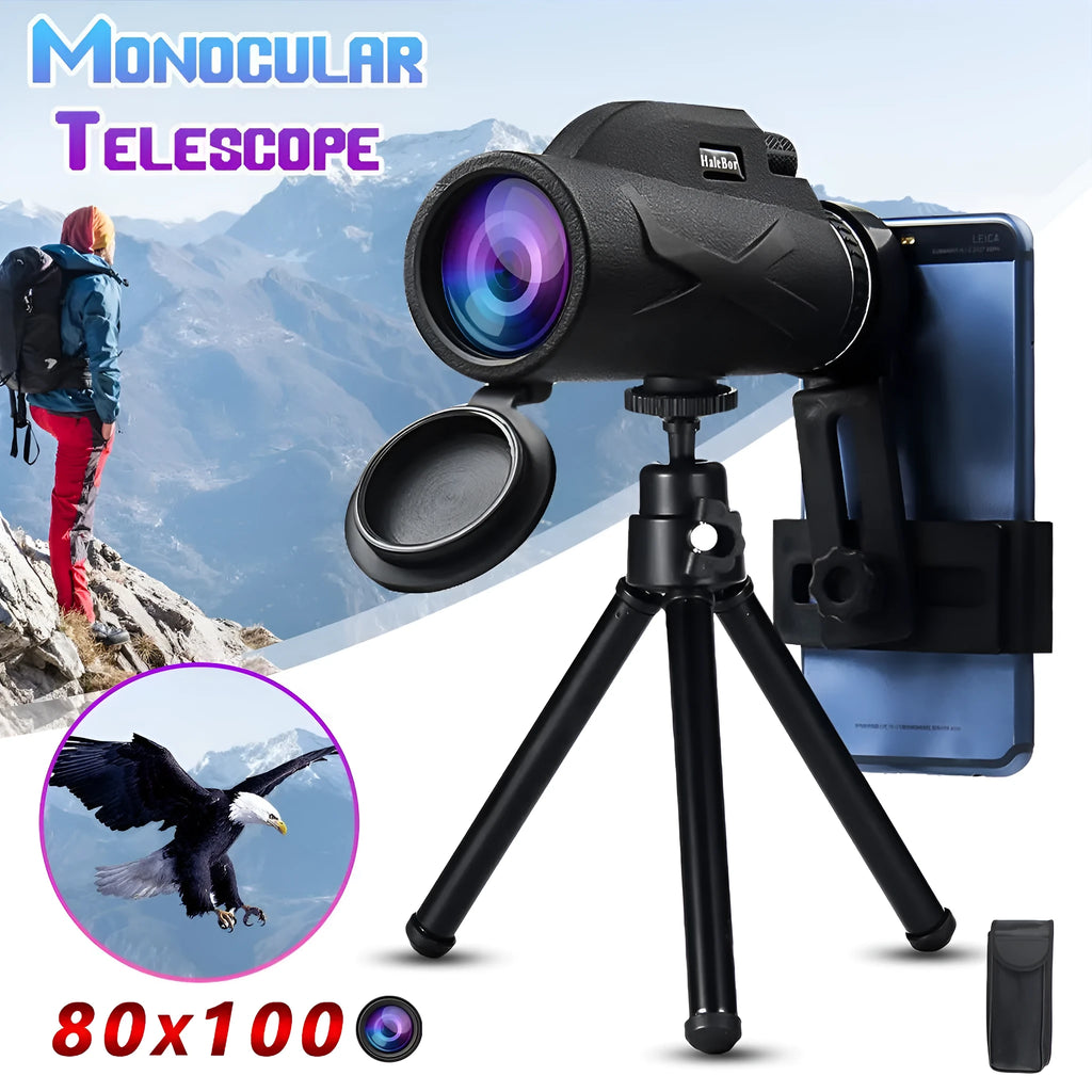 Black 80x magnification spotting telescope monocular with tripod and phone clip on outdoor surface