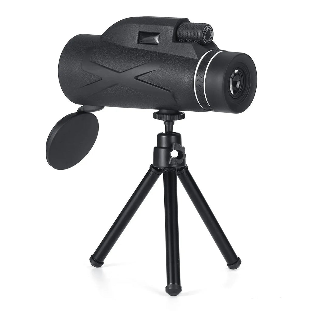 Black 80x magnification spotting telescope monocular with tripod and phone clip on outdoor surface