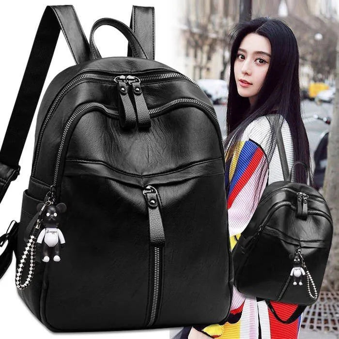 Black soft PU leather backpack with double straps showing 24cm size and plain pattern