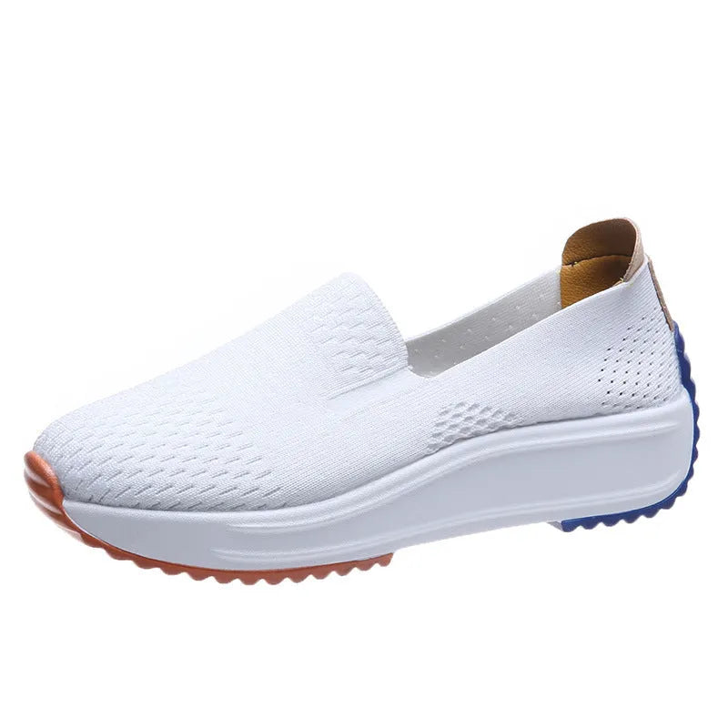 Women's lightweight mesh running shoes in white with composite sole, side view