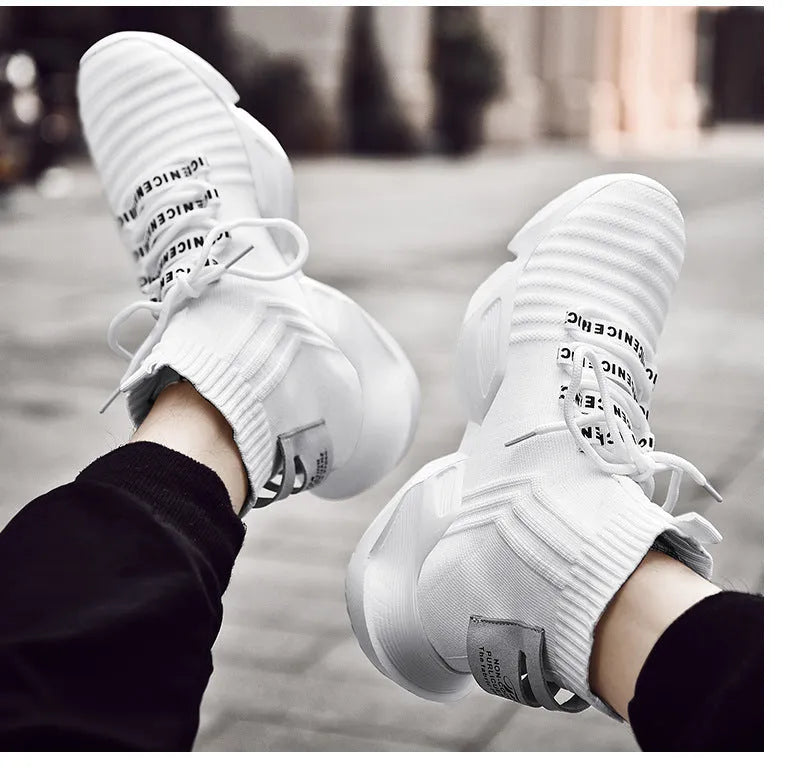 Men's black and white casual sports shoes with mesh interior lining available in UK sizes 39 to 47