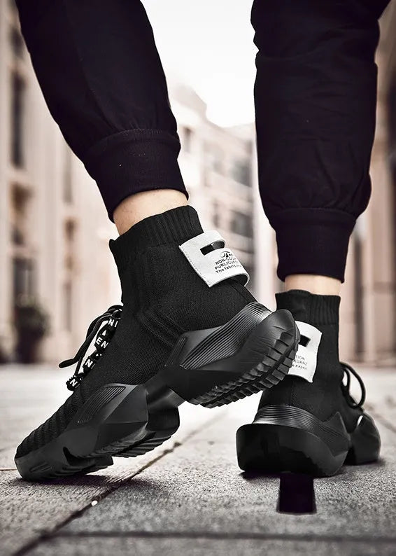 Men's black and white casual sports shoes with mesh interior lining available in UK sizes 39 to 47
