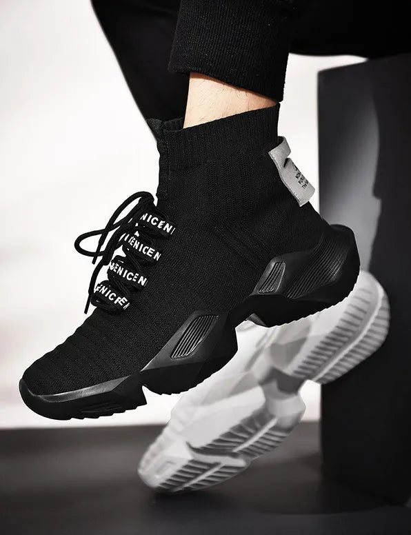 Men's black and white casual sports shoes with mesh interior lining available in UK sizes 39 to 47