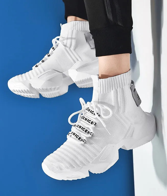Men's black and white casual sports shoes with mesh interior lining available in UK sizes 39 to 47