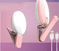 Mini round clip fill light for mobile phones in white pink blue or black colour options