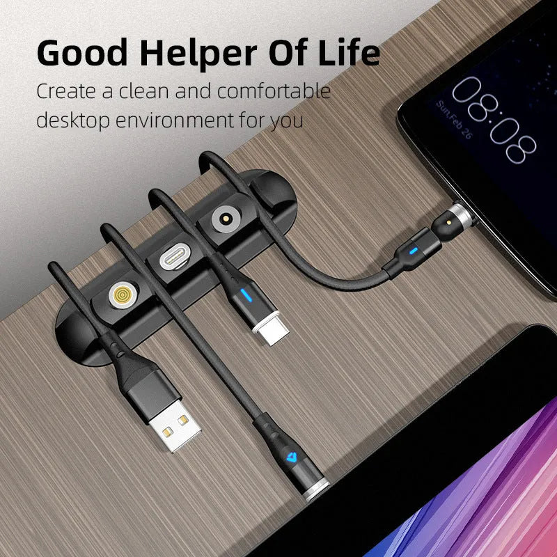Black soft plastic desktop charging magnetic data cable organiser for cable management