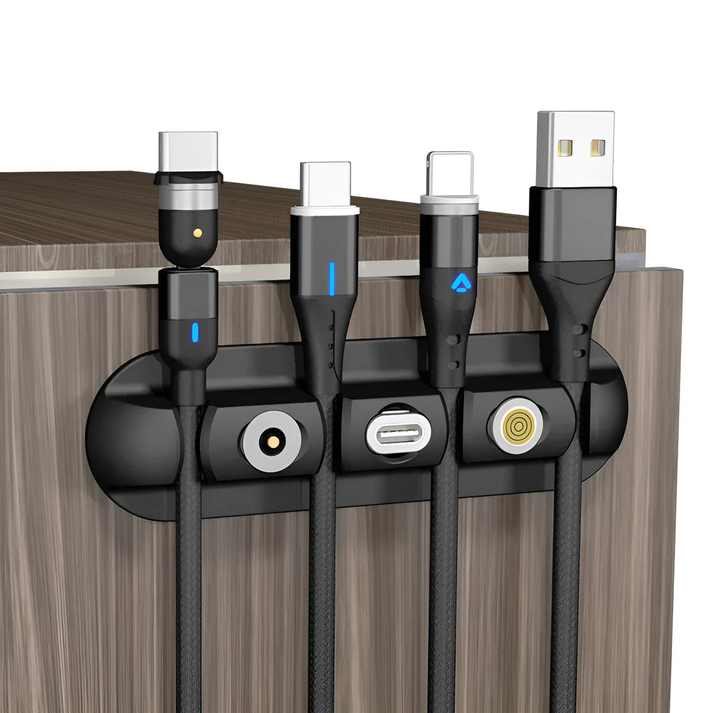 Black soft plastic desktop charging magnetic data cable organiser for cable management