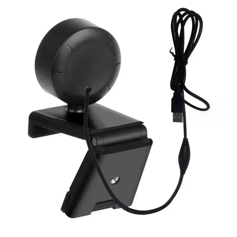 White USB computer webcam with a built-in ring of LED lights and a wide-angle lens on a monitor