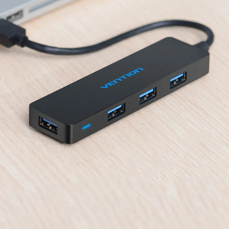 Black four-port USB 3.0 hub with 0.15 metre cable and nickel-plated connectors