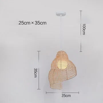 Snail-shaped rattan pendant light with woven grass and rattan shade, 350mm diameter, LED source, adjustable height, on a dark background