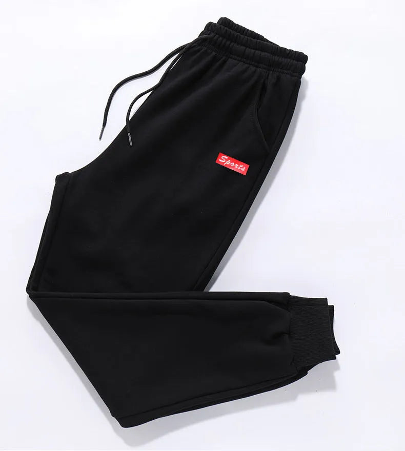 Mens loose fit casual trousers in polyester fabric, nine length, mid waist, small leg opening, available in multiple colours and sizes