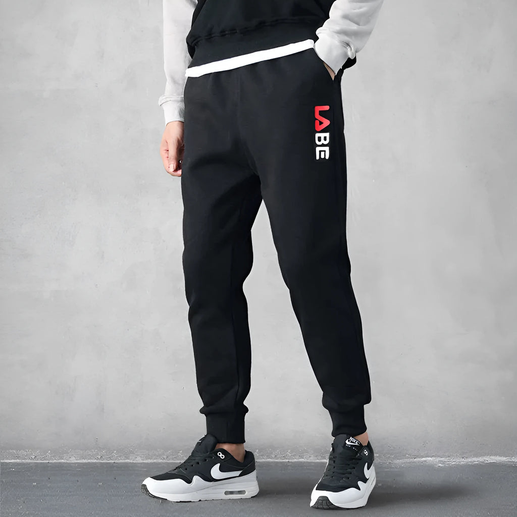 Mens loose fit casual trousers in polyester fabric, nine length, mid waist, small leg opening, available in multiple colours and sizes