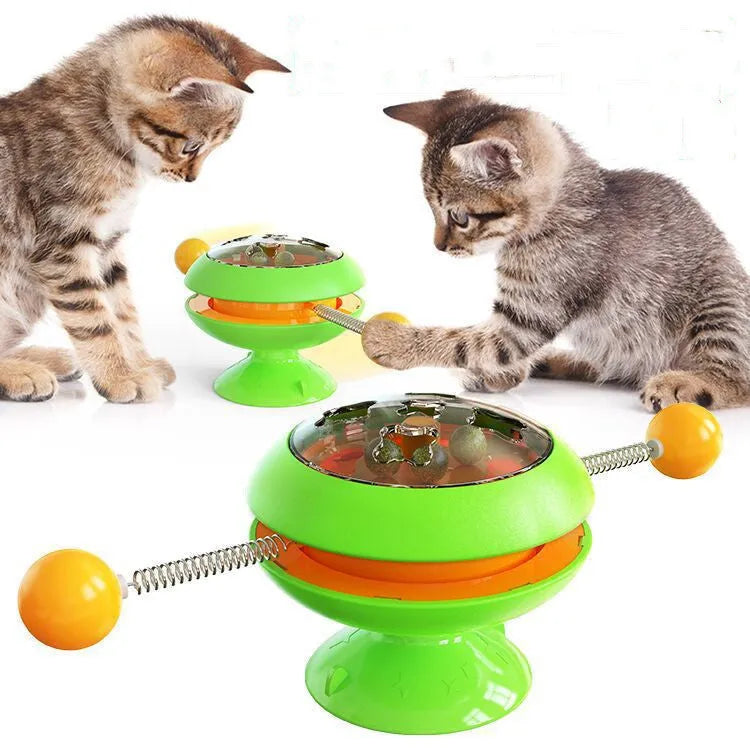 Rotatable interactive cat toy with suction cup base in lake blue, yellow, green, or pink.