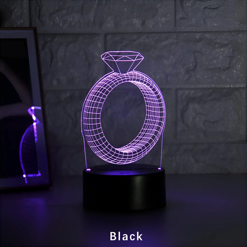 3D diamond ring LED night light with colour changing modes on black background