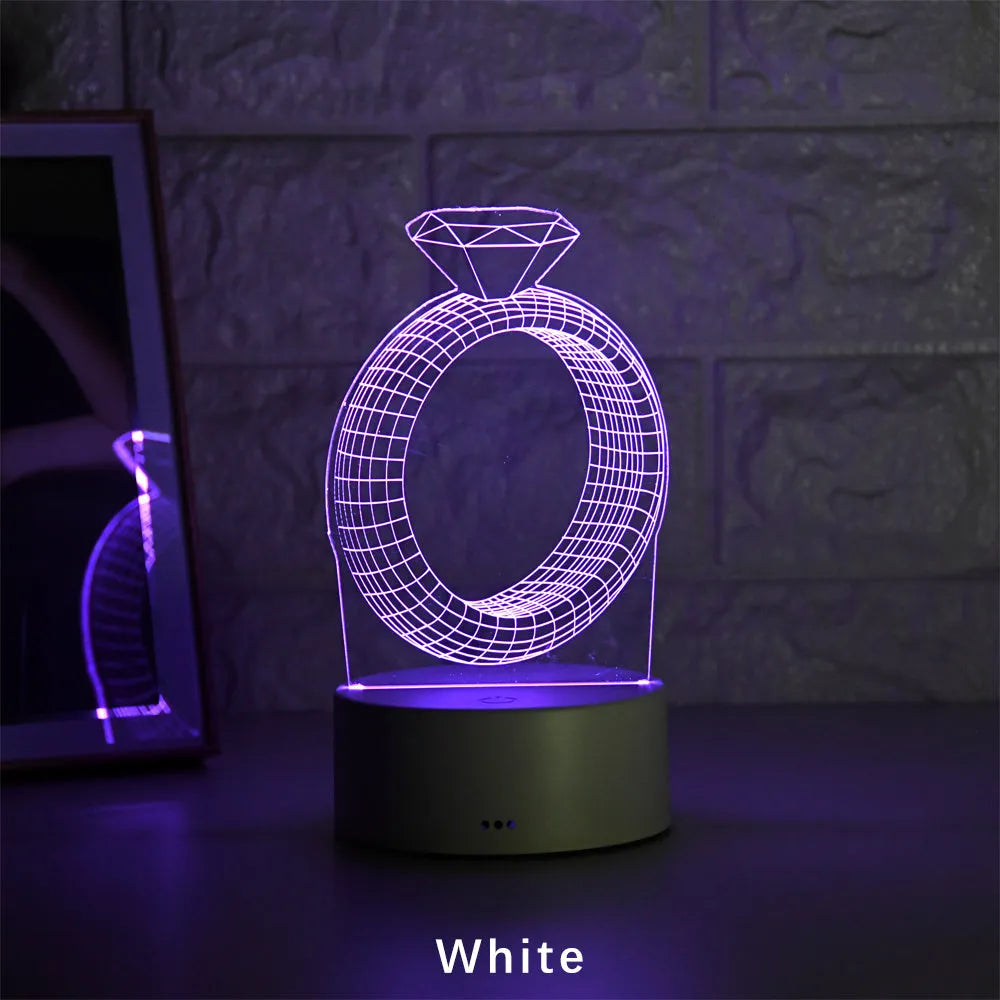 3D diamond ring LED night light with colour changing modes on black background