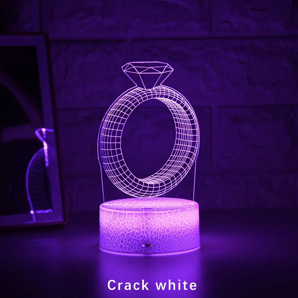 3D diamond ring LED night light with colour changing modes on black background