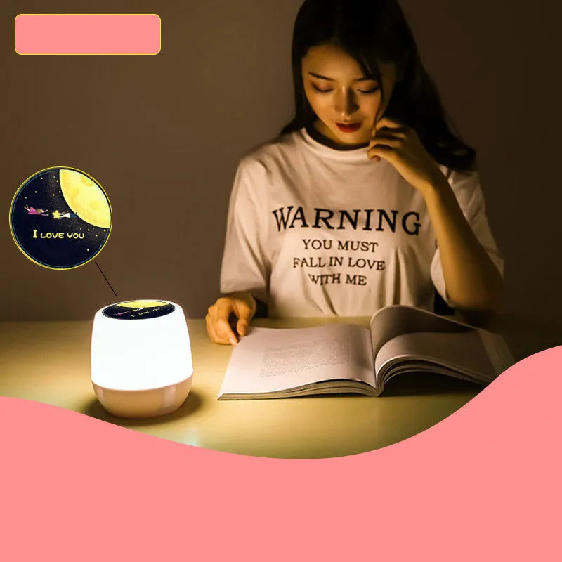Pruixin rotating projector night light displaying star and love patterns on a wall