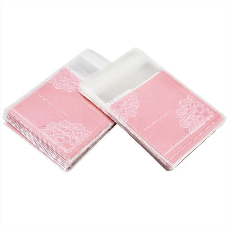 Pink self-adhesive plastic packaging bags for handmade soaps, 7cm by 7cm with 3cm flap