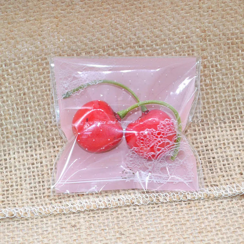 Pink self-adhesive plastic packaging bags for handmade soaps, 7cm by 7cm with 3cm flap