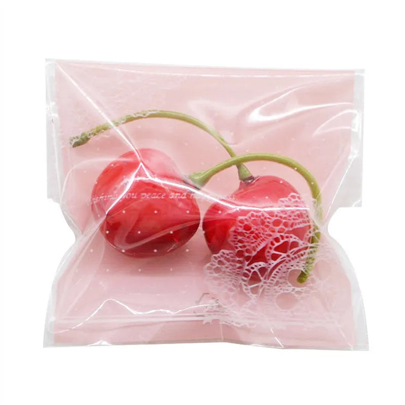 Pink self-adhesive plastic packaging bags for handmade soaps, 7cm by 7cm with 3cm flap