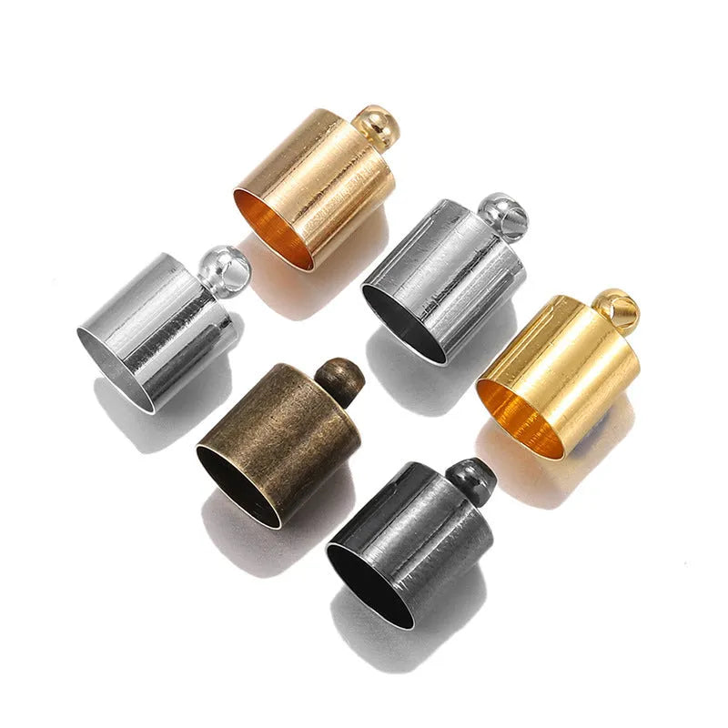 Assorted copper bell weight caps and tassel caps in various electroplated colours and sizes for jewellery making.