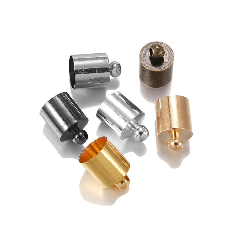 Assorted copper bell weight caps and tassel caps in various electroplated colours and sizes for jewellery making.
