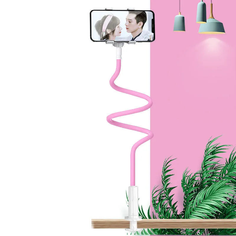 Blue mobile phone holder with a bendable memory alloy hose, holding a smartphone on a bedside table.