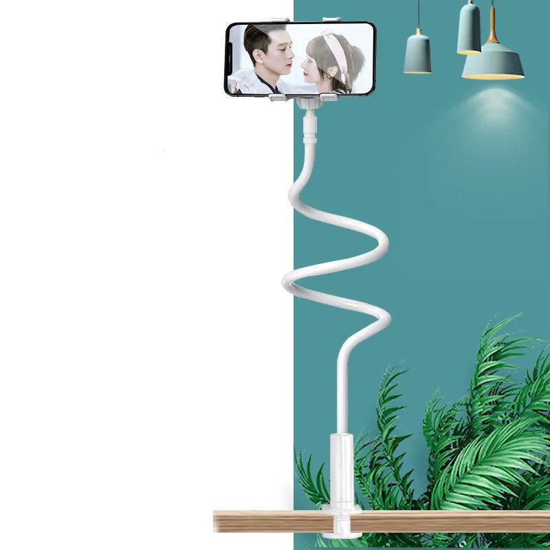 Blue mobile phone holder with a bendable memory alloy hose, holding a smartphone on a bedside table.