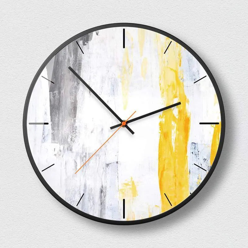 Round abstract art wall clock with metal frame and black pattern designs showing sweep second hand