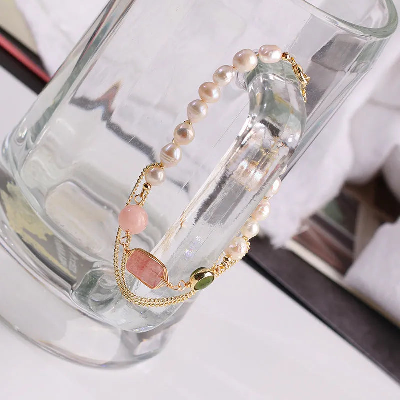 Women's freshwater pearl bracelet with geometric strawberry crystal charm on adjustable 16.5cm chain