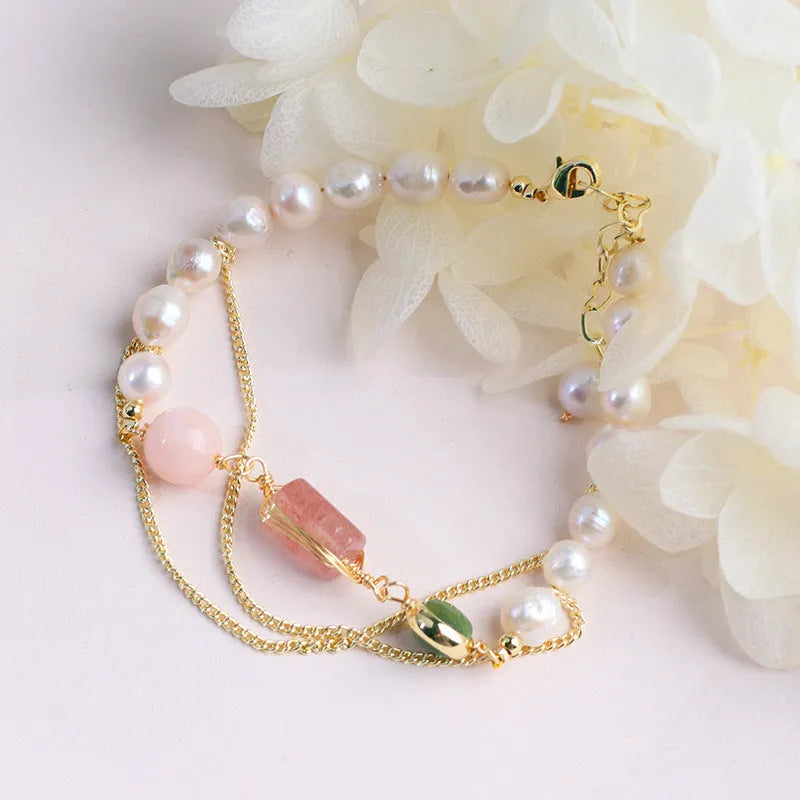 Women's freshwater pearl bracelet with geometric strawberry crystal charm on adjustable 16.5cm chain