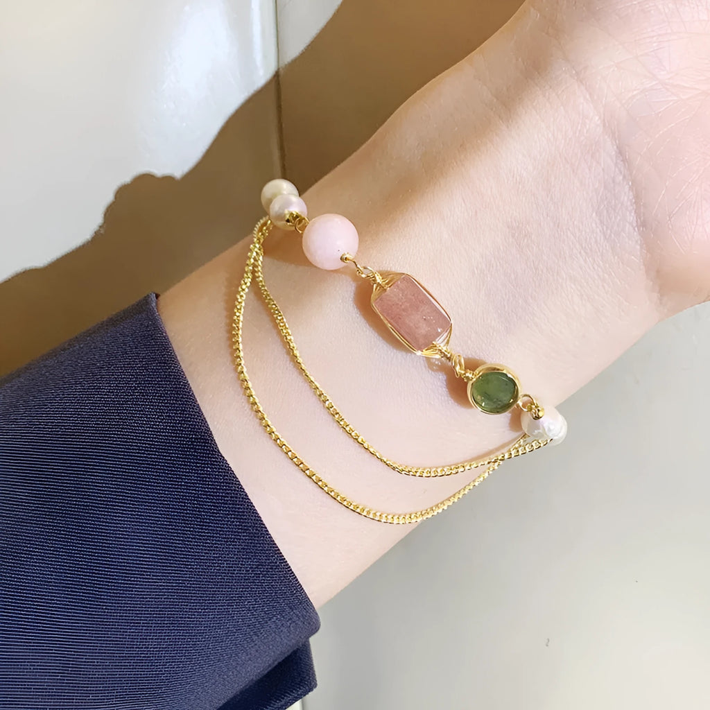 Women's freshwater pearl bracelet with geometric strawberry crystal charm on adjustable 16.5cm chain