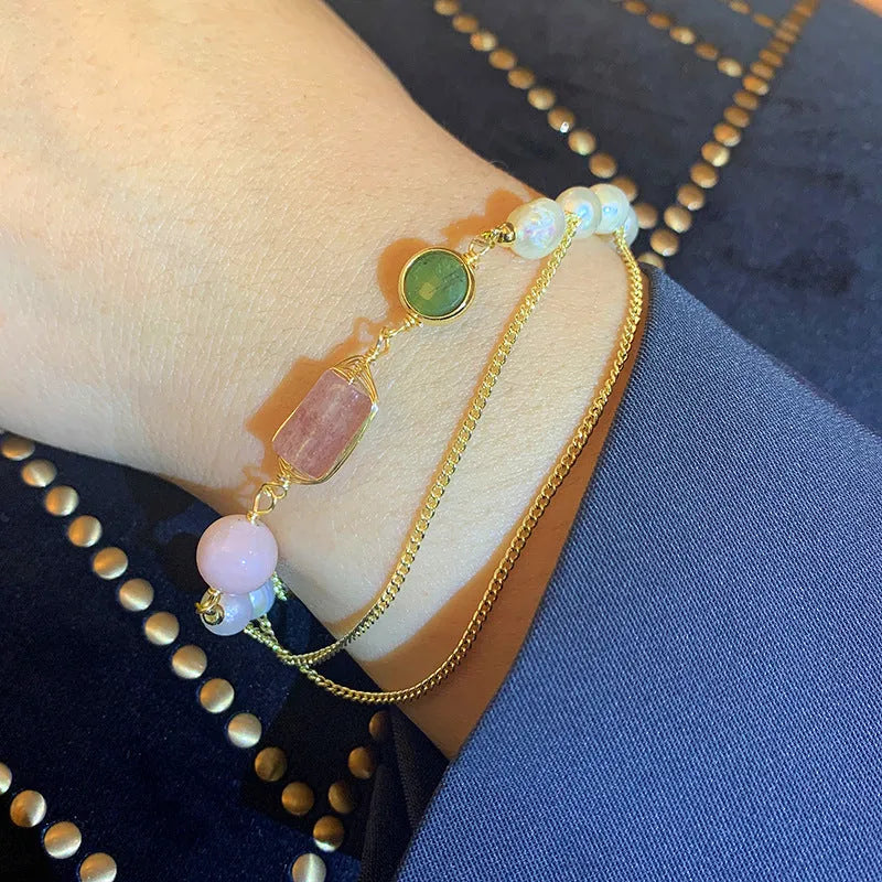 Women's freshwater pearl bracelet with geometric strawberry crystal charm on adjustable 16.5cm chain