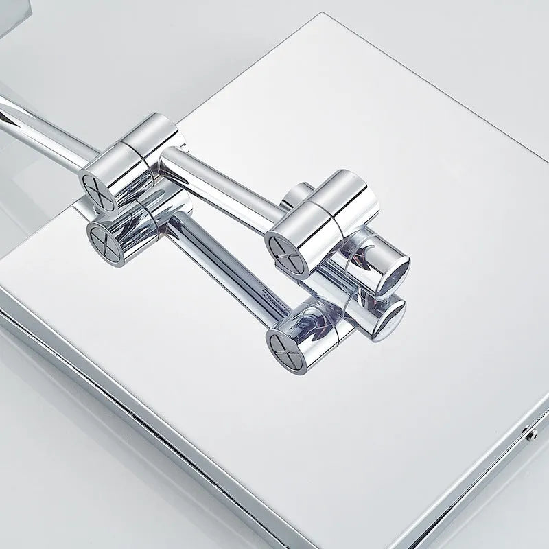 8.5 inch stainless steel folding makeup mirror in antique black finish on a vanity.