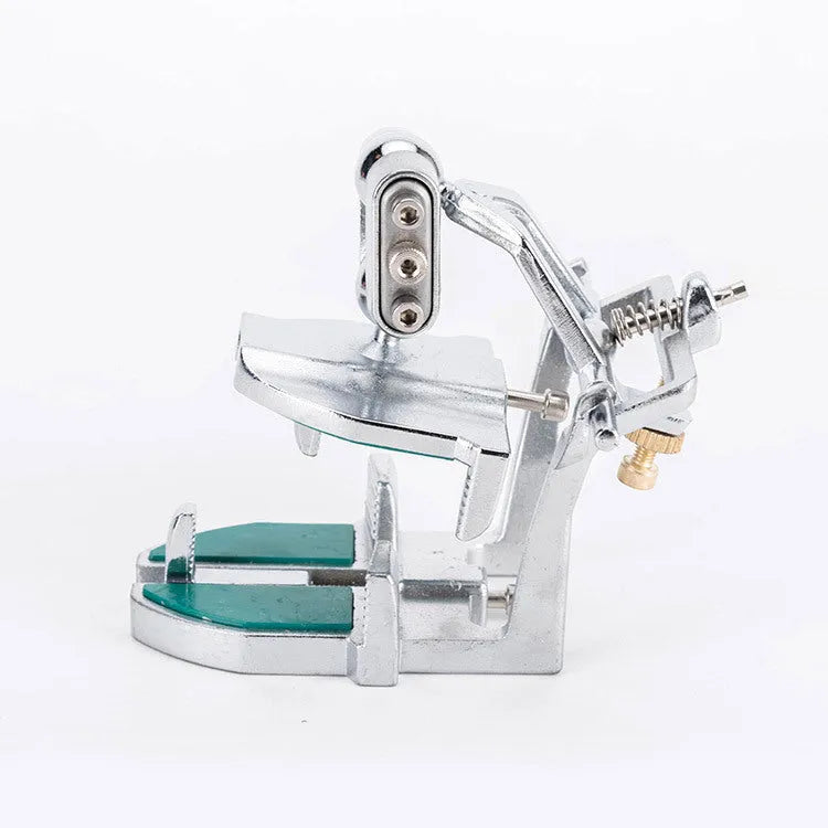 Korean dental laboratory articulator with adjustable arms for mounting adult jaw models.