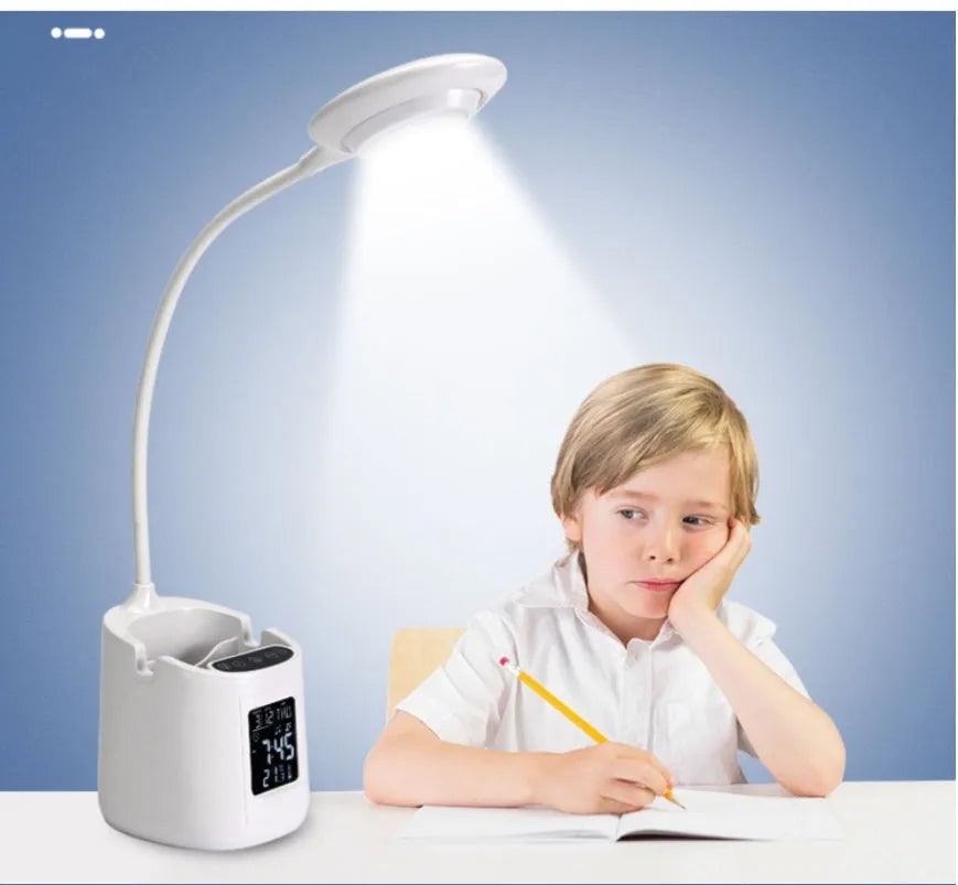 White USB desk lamp with touch switch control on a wooden desk.