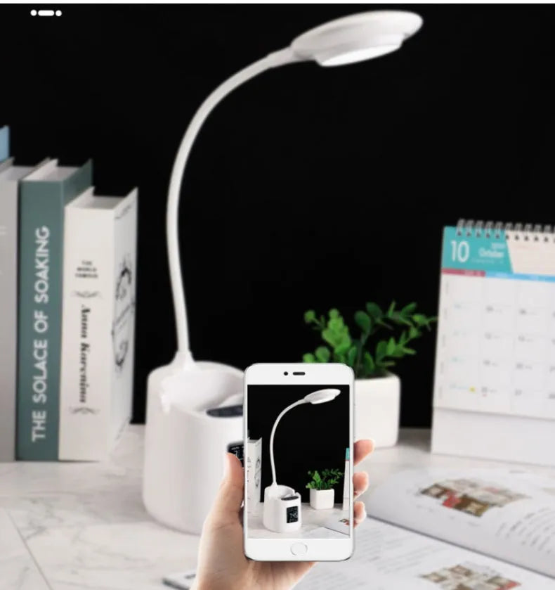 White USB desk lamp with touch switch control on a wooden desk.